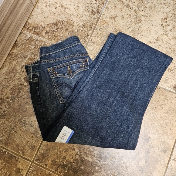 Levi's I  515 Mid Rise Boot Cut Jeans. - Picture 9 of 11